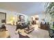 Bright living room with comfortable seating, stylish decor and a large decorative plant at 1430 Brian Rd, Charleston, SC 29407