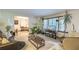 Cozy living room featuring natural light, comfortable seating, and stylish furnishings at 1430 Brian Rd, Charleston, SC 29407