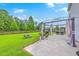 Backyard featuring a fire pit, large lawn, a grill and pergola-covered patio with seating at 146 Chaste Tree Cir, Goose Creek, SC 29445