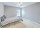 Bedroom featuring gray walls, one window, neutral carpet and a bed with gray bedding at 146 Chaste Tree Cir, Goose Creek, SC 29445