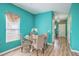 Cozy dining area featuring wood flooring and a decorative window treatment at 146 Chaste Tree Cir, Goose Creek, SC 29445