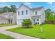 Charming two-story home with a well-manicured lawn and inviting curb appeal in a Gathering-friendly neighborhood at 146 Chaste Tree Cir, Goose Creek, SC 29445
