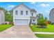 Charming two-story home with a well-manicured lawn and attached two car garage at 146 Chaste Tree Cir, Goose Creek, SC 29445