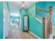 Bright hallway with decorative mirror, wood-look floors, and easy access to living areas at 146 Chaste Tree Cir, Goose Creek, SC 29445