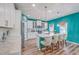 Bright eat-in kitchen featuring stainless steel appliances, a large island, and ample cabinet space at 146 Chaste Tree Cir, Goose Creek, SC 29445