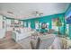 Spacious open-concept living room with hardwood floors, comfortable seating, and access to kitchen at 146 Chaste Tree Cir, Goose Creek, SC 29445