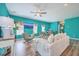 Bright living room with open concept dining area, wood flooring, and relaxing natural light at 146 Chaste Tree Cir, Goose Creek, SC 29445