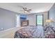 Comfortable main bedroom with a TV above the fireplace and neutral decor at 146 Chaste Tree Cir, Goose Creek, SC 29445