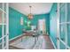 Bright office space with hardwood flooring, neutral decor, and stylish light fixtures at 146 Chaste Tree Cir, Goose Creek, SC 29445