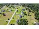 Wide aerial view of the home among a residential area of homesites and verdant landscapes at 148 Hidden Hills Rd, Cross, SC 29436