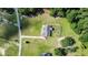 Aerial shot showcasing a home with a long driveway and well-maintained green spaces at 148 Hidden Hills Rd, Cross, SC 29436