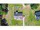 Bird's eye view of the home with its fenced yard and expansive green lawn at 148 Hidden Hills Rd, Cross, SC 29436