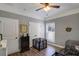 Neutral bedroom with wood floors, ceiling fan, and window with blinds at 148 Hidden Hills Rd, Cross, SC 29436