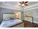 Bedroom featuring hardwood floors, trey ceilings, neutral paint, and dresser at 148 Hidden Hills Rd, Cross, SC 29436
