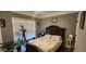 Bright bedroom with large window and wood-look floors at 148 Hidden Hills Rd, Cross, SC 29436