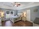 Bedroom featuring trey ceilings, hardwood floors, natural light, and neutral paint at 148 Hidden Hills Rd, Cross, SC 29436