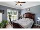 Bedroom featuring hardwood floors, natural light and fitness equipment at 148 Hidden Hills Rd, Cross, SC 29436