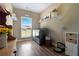 Well-lit laundry room with modern washer and dryer, shelves, and window at 148 Hidden Hills Rd, Cross, SC 29436