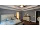Spacious main bedroom featuring tray ceilings and decorative trim at 148 Hidden Hills Rd, Cross, SC 29436