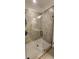 Tiled shower with glass door and matte black hardware at 148 Hidden Hills Rd, Cross, SC 29436