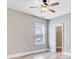 Cozy bedroom with hardwood floors, a ceiling fan, and a view from the window at 1485 Bourne Xing, Mount Pleasant, SC 29466