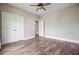 Large bedroom with hardwood floors, double closets, and neutral walls at 1485 Bourne Xing, Mount Pleasant, SC 29466