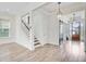 Spacious foyer with a view of front door, barn door, and staircase at 1485 Bourne Xing, Mount Pleasant, SC 29466