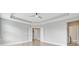 Large bedroom with hardwood floors, ceiling fan, and tray ceiling at 1485 Bourne Xing, Mount Pleasant, SC 29466