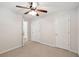Bedroom with neutral carpet and two white doors, one of which is open, revealing a connecting room at 1505 Blaze Ln, Charleston, SC 29412