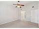 Neutral bedroom with ceiling fan and ensuite bathroom access at 1505 Blaze Ln, Charleston, SC 29412