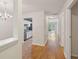 Inviting entryway with hardwood floors offering views into the kitchen and living areas at 1505 Blaze Ln, Charleston, SC 29412