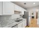 Renovated kitchen with stainless steel appliances, double sink, and granite countertops at 1505 Blaze Ln, Charleston, SC 29412
