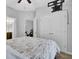 Bright bedroom featuring neutral walls, plush carpeting, a closet, ceiling fan, and ensuite bathroom at 1550 Spring Moss Rd, Mount Pleasant, SC 29466