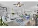 Open-concept living room with hardwood floors, elegant furnishings and decor at 1550 Spring Moss Rd, Mount Pleasant, SC 29466