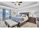Main bedroom featuring trey ceilings, ceiling fan, and sitting area near window at 1550 Spring Moss Rd, Mount Pleasant, SC 29466