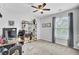Home office with a desk, shelving, decor and natural light, creating a productive and inspiring workspace at 1550 Spring Moss Rd, Mount Pleasant, SC 29466