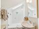 Bathroom featuring a walk-in shower with a glass enclosure, skylight, and modern fixtures at 1612 John Fenwick Ln, Johns Island, SC 29455