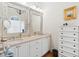 Bright bathroom features double sinks, framed mirrors, and ample counter space at 1612 John Fenwick Ln, Johns Island, SC 29455