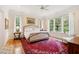 Inviting bedroom with hardwood floors, natural light, and a plush rug at 1612 John Fenwick Ln, Johns Island, SC 29455