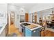 Kitchen island offers a cooktop and marble counters at 1612 John Fenwick Ln, Johns Island, SC 29455