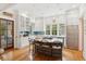 Bright, spacious kitchen with custom cabinetry, stainless steel appliances, and marble countertops, perfect for cooking at 1612 John Fenwick Ln, Johns Island, SC 29455