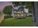 Charming backyard with a spacious deck, lush green lawn, and privacy fence, ideal for outdoor enjoyment at 1616 Dotterers Run, Charleston, SC 29414