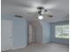 Neutral-toned bedroom with a ceiling fan, closet, and bright windows at 1616 Dotterers Run, Charleston, SC 29414