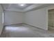 Spacious bedroom features neutral carpet, tray ceilings, and ample natural light for a relaxing ambiance at 1616 Dotterers Run, Charleston, SC 29414