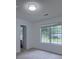 Bright bedroom with neutral carpet, large window, and adjacent closet at 1616 Dotterers Run, Charleston, SC 29414