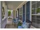 Cozy front porch featuring blue accents and comfortable seating at 1616 Dotterers Run, Charleston, SC 29414