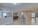 Open-concept kitchen with bar seating and views of the living room at 1616 Dotterers Run, Charleston, SC 29414
