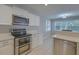 Modern kitchen equipped with stainless steel appliances and ample counter space at 1616 Dotterers Run, Charleston, SC 29414