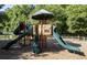 A playground with slides and tunnels and wood chip ground covering in recreational area at 1616 Dotterers Run, Charleston, SC 29414