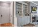 Living room features built-in shelving, fireplace, and hardwood floors for a cozy feel at 163 Golfview Ln, Summerville, SC 29485